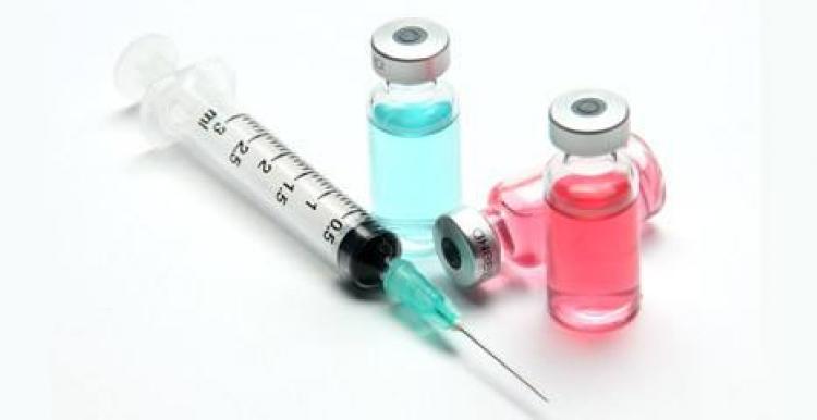 immunisation needle and bottle