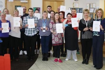 staff recieving a carers award