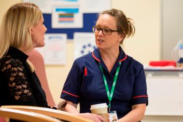 nurse chatting to patient